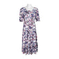 https://cdn.shopify.com/s/files/1/0062/5351/0738/files/connected-apparel-short-sleeve-floral-print-dress-the-dress-outlet-1.jpg?v=1747858091